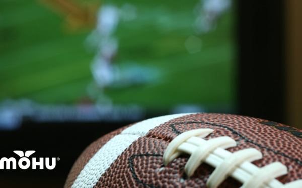 Football in front of TV screen with Mohu Logo